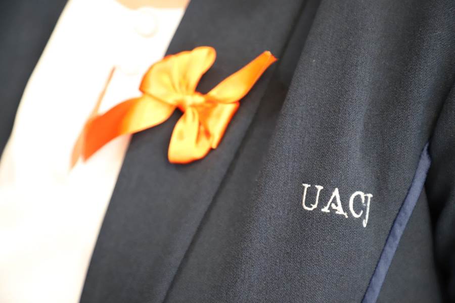 UACJ-dia naranja