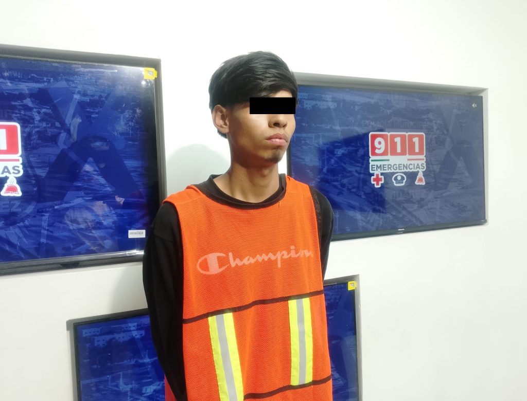 presunto sicario con arma